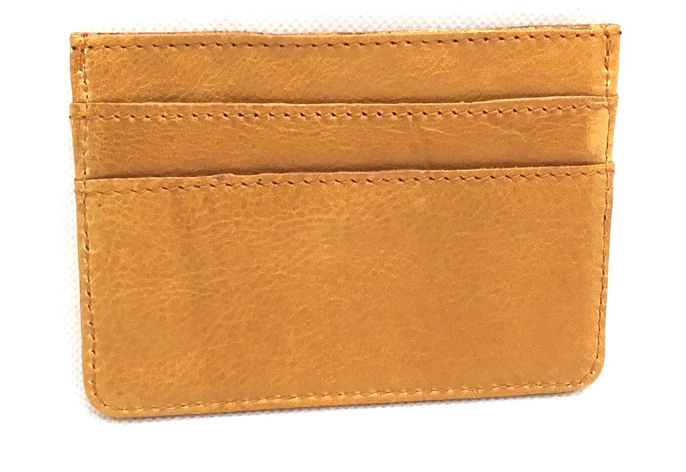 Cooper Allan Slime Credit Card Case in full grain  leather with 4 card slots and a section for notes in the middle.